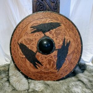 3 hand carved black ravens and wrym dragons on round Viking style shield