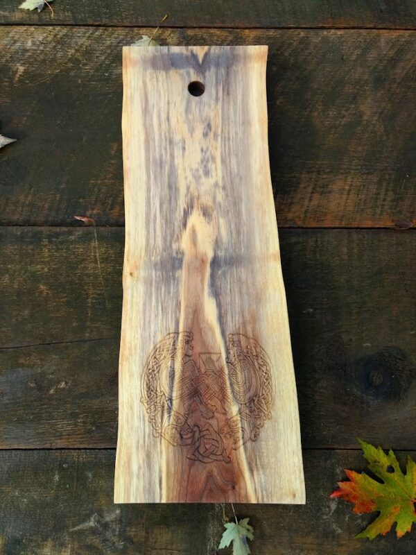 Viking celebration knot carved into a black walnut charcuterie board