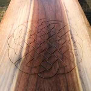 “Celtic Shield" knot is set into a piece of Black Walnut close-up