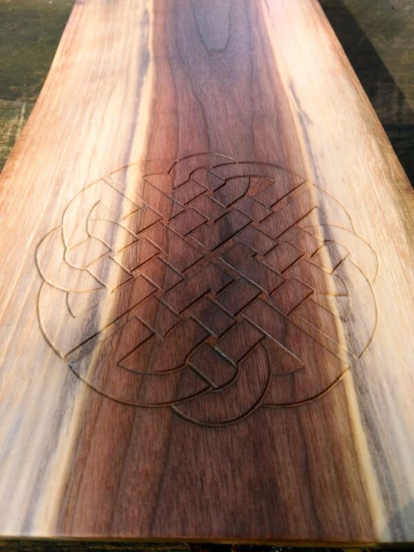 “Celtic Shield" knot is set into a piece of Black Walnut close-up