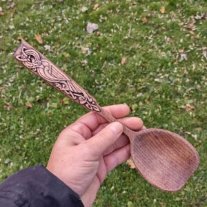 celtic zoomorph turkey hand carved into a beech wood spatula