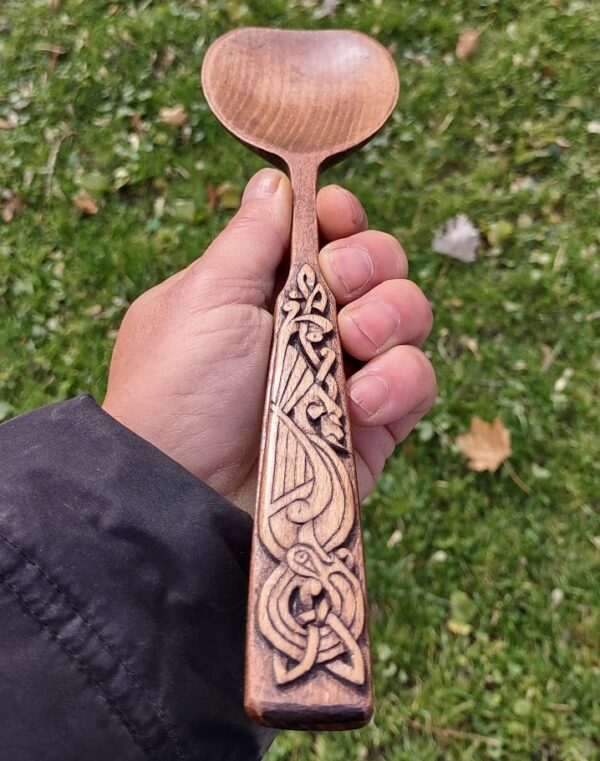 celtic zoomorph turkey hand carved into a beech wood spatula